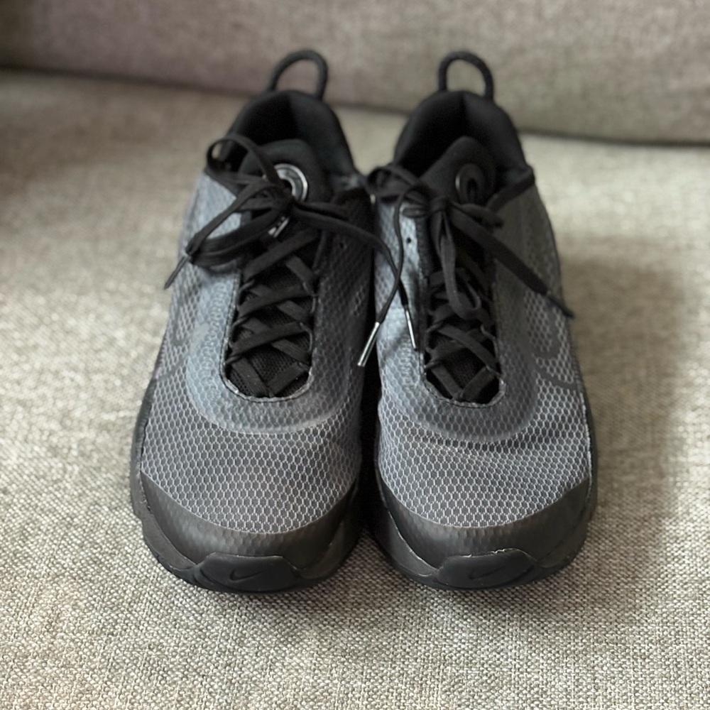 Black and Gray Nike 2090, size 6y but will fit a women’s size 8